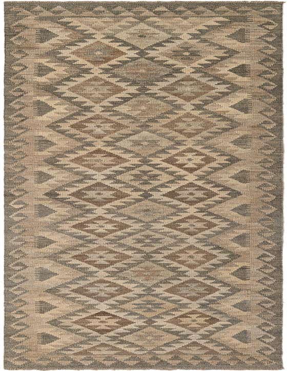 A 10 ft runner rug featuring a tribal geometric pattern in shades of gray, silver, and natural brown.