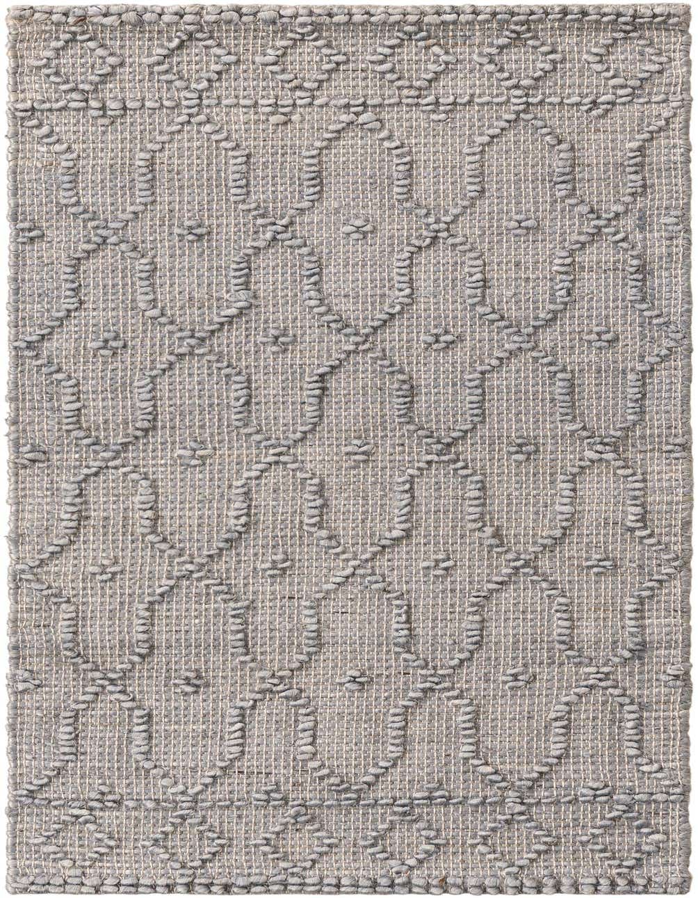 A 4 ft runner rug in gray with a modern trellis pattern, made from textured jute and cotton.