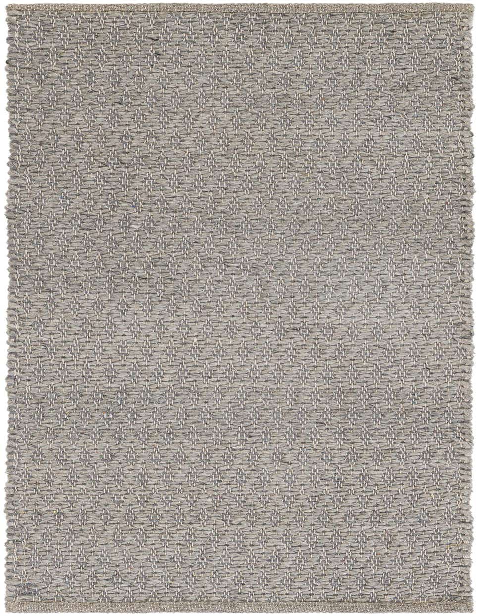 A 4 ft gray runner rug with a textured, flatweave pattern, handmade from wool and cotton.