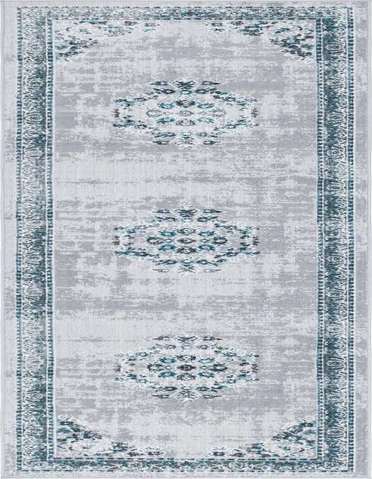 A 10 ft runner rug in gray and silver with a distressed Bohemian medallion pattern and intricate teal border.