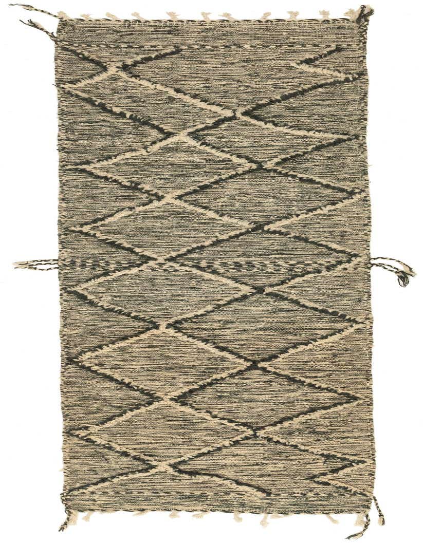 A 10 ft runner rug in shades of gray and silver, featuring a tribal diamond pattern and shag pile, perfect for a hallway.