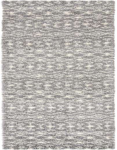 A long 16 ft runner rug with a gray and off-white tribal pattern, featuring a plush shag pile.