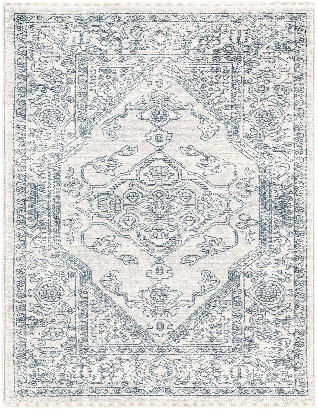 A 4 ft runner rug in shades of gray and silver, featuring a distressed traditional medallion and tribal pattern.