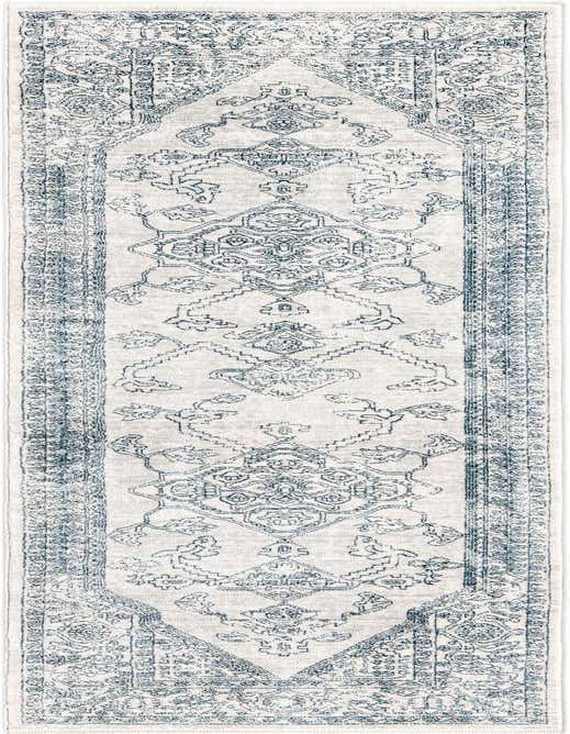 A gray and silver 8 ft runner rug with a traditional medallion and tribal pattern, ideal for a hallway or kitchen.