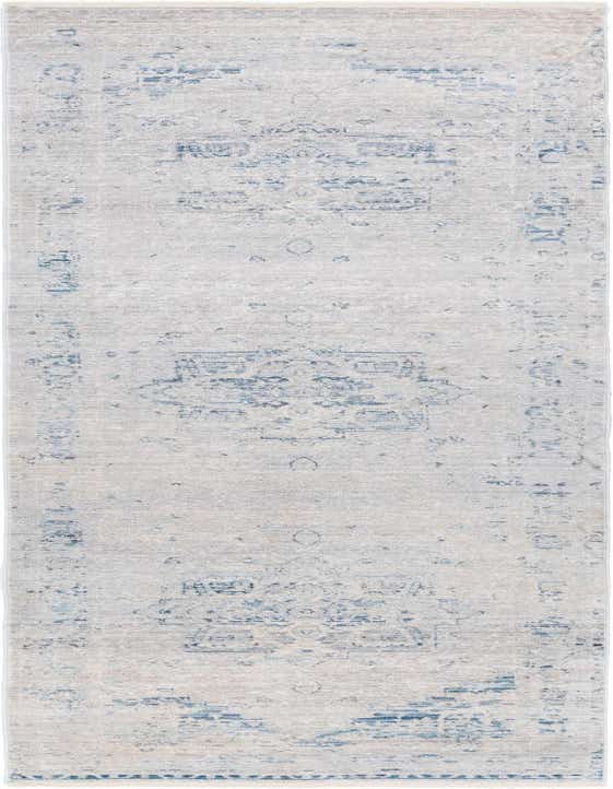 A 10 ft runner rug in grays and silvers with a faded traditional medallion pattern, ideal for a hallway.