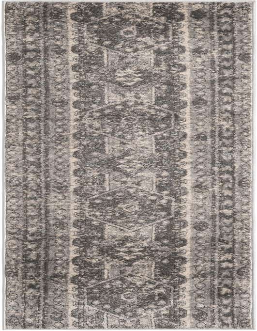 A gray and silver 8 ft runner rug with a distressed Bohemian tribal pattern, ideal for a hallway.