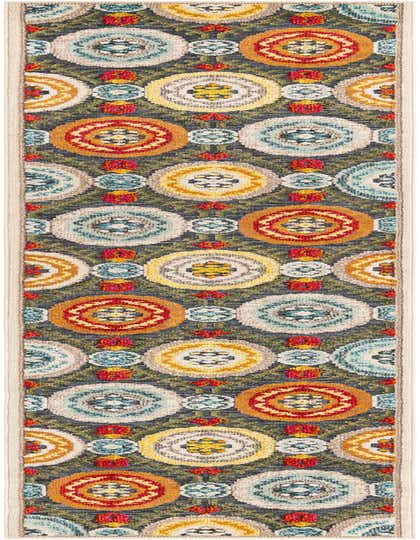 A 12 ft runner rug with a modern pattern of colorful concentric circles in teal, orange, yellow, and beige on a gray background, ideal for a hallway or patio.