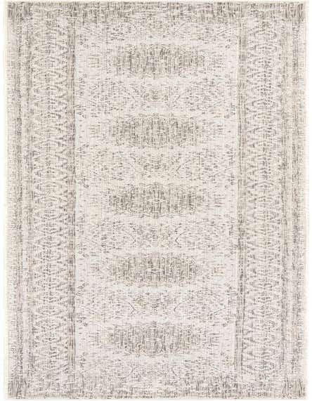 A 12 ft gray and silver vintage runner rug with a distressed medallion pattern, ideal for a hallway or patio.