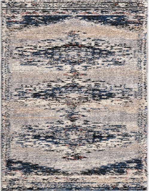 A gray and silver 8 ft runner rug with a distressed Southwestern medallion pattern and hints of blue and red.