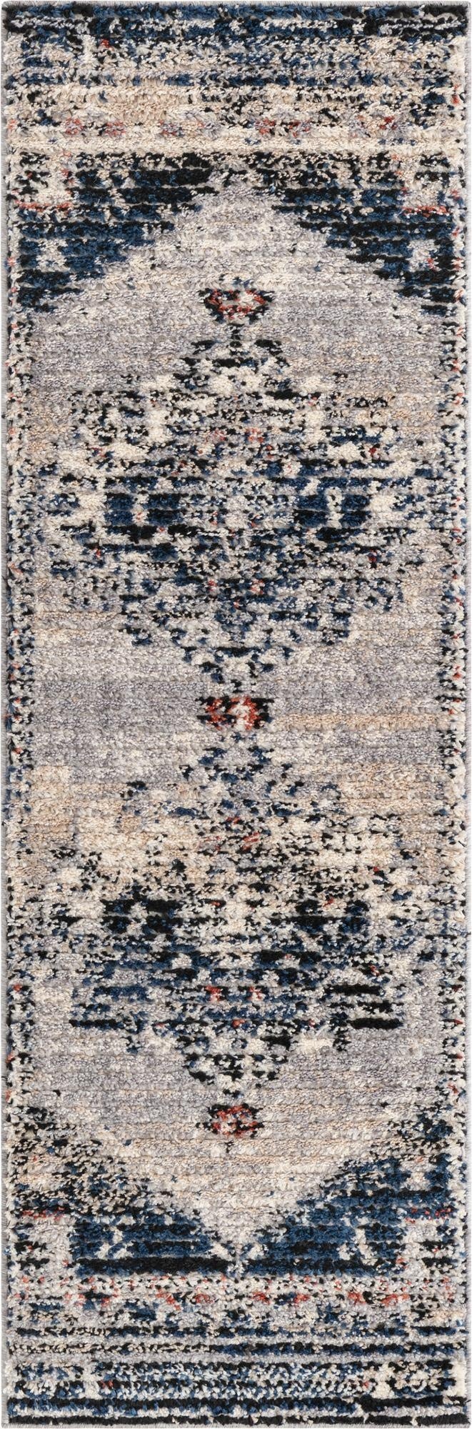 A 6 ft runner rug from the Tucson collection, featuring a distressed medallion pattern in grays, silvers, and deep blues with hints of red.