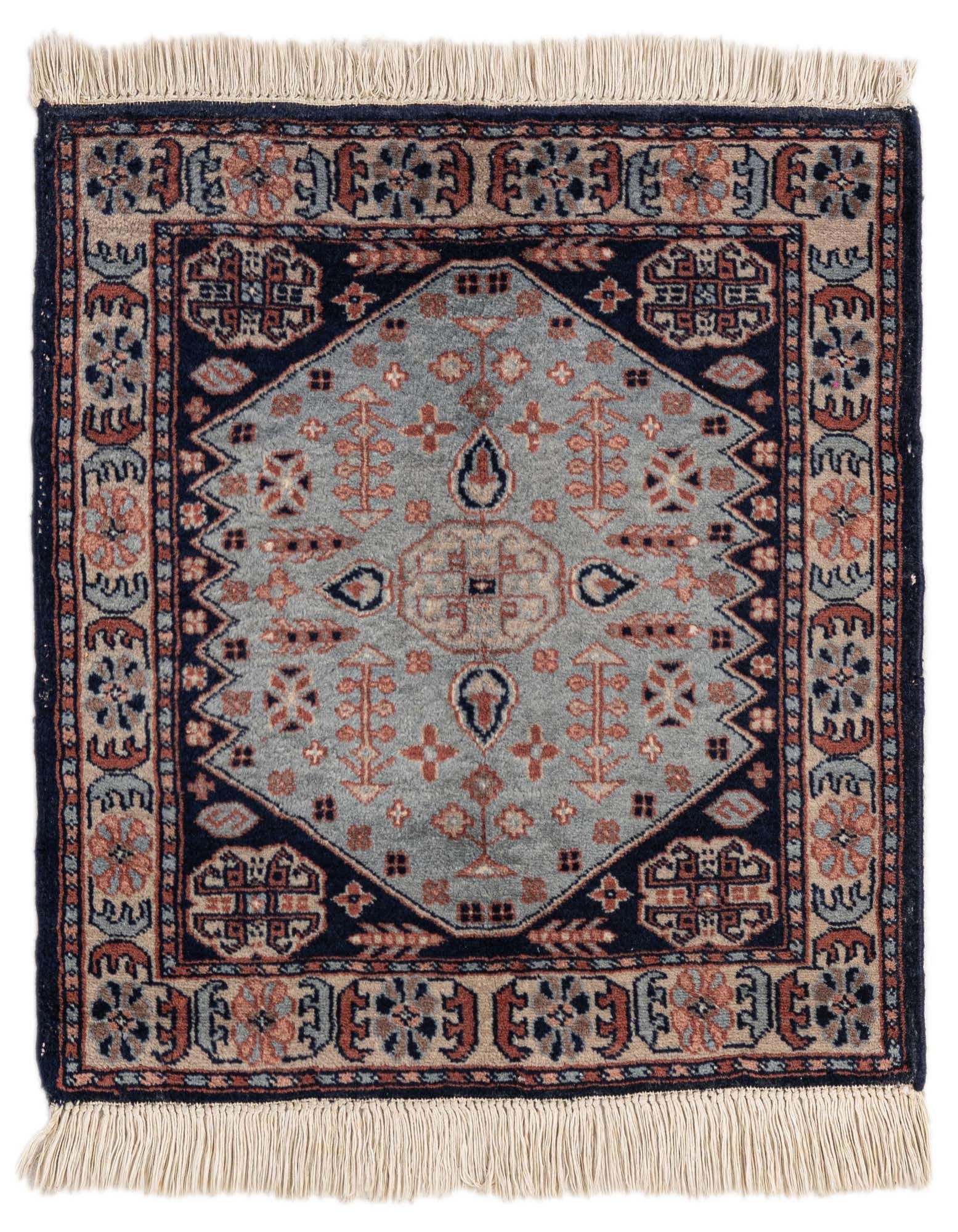 A 2'x2' square Bokhara tribal wool rug featuring a central gray field with intricate patterns in navy, rust, and beige, framed by a dark border and fringe.