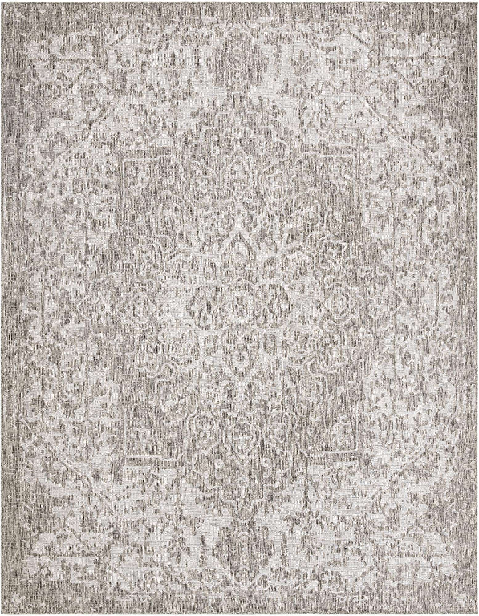 A 13' square gray indoor/outdoor rug with a distressed traditional medallion pattern, ideal for a patio.