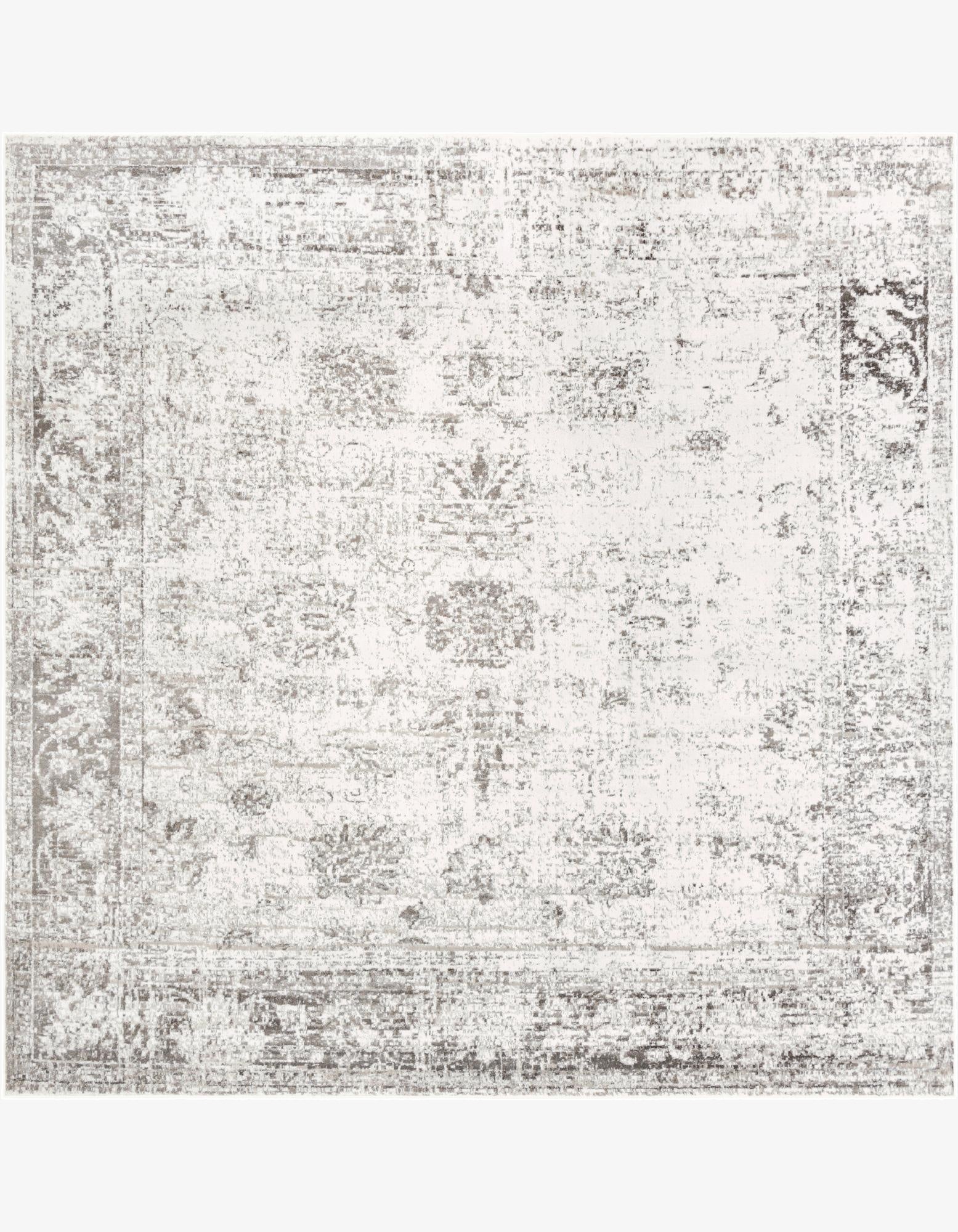 A 13' 1 x 13' 1 square gray and silver transitional area rug with a distressed medallion pattern.