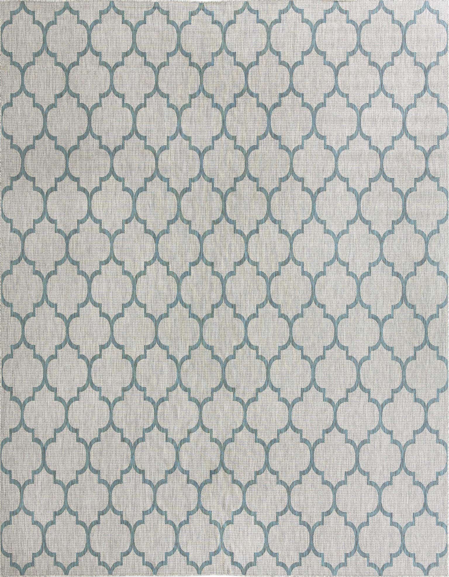 A large square gray and teal trellis pattern rug, suitable for indoor or outdoor use on a patio.