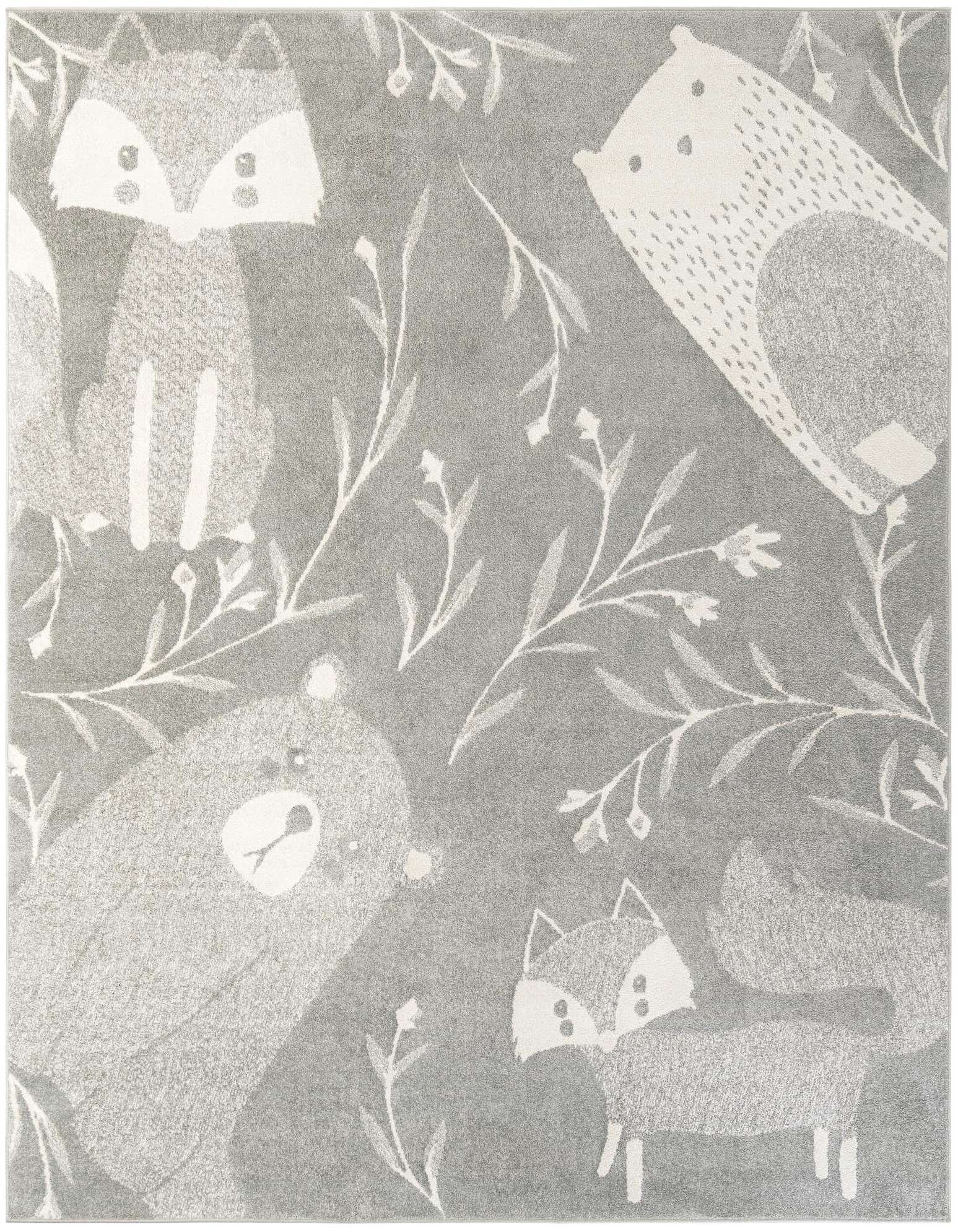 A gray square rug featuring a whimsical pattern of white woodland animals like foxes, a bear, and a hedgehog, surrounded by delicate white foliage.