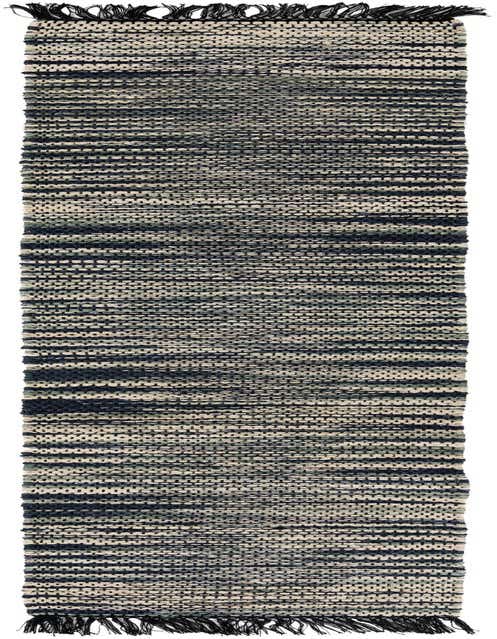 A 12 ft runner rug from the Chunky Jute collection, featuring a textured flatweave pattern in shades of ivory, cream, and green, with black fringe.