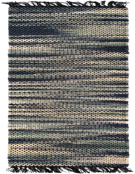An 8 ft runner rug from the Chunky Jute collection, featuring a textured flatweave in shades of ivory, cream, and green, with dark fringe.