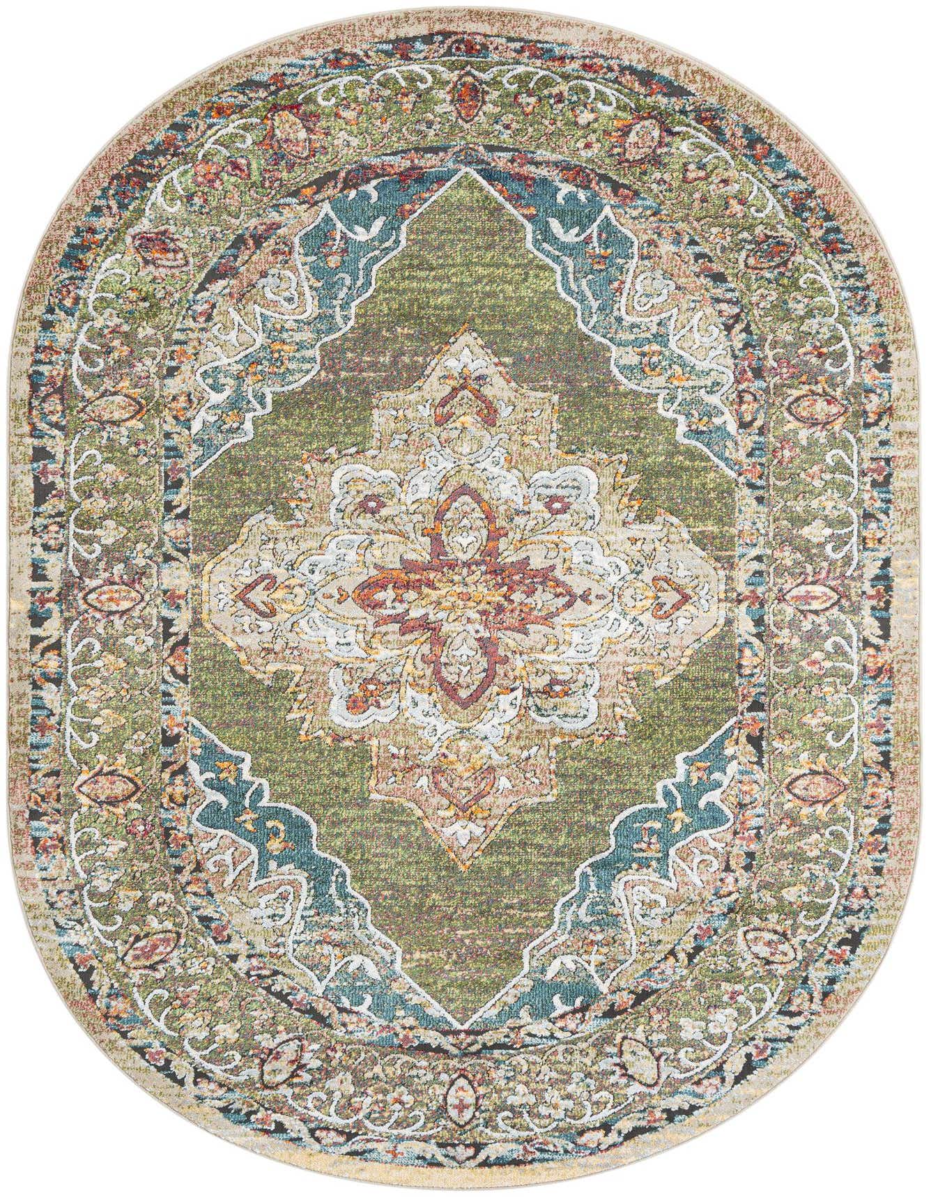 An oval Isabella Collection rug, 6' x 9', featuring a green traditional medallion pattern with vintage accents.