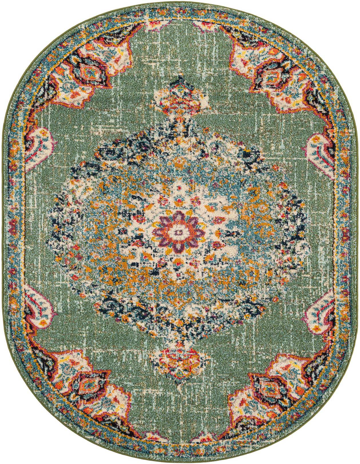 An oval 5'3" x 8'0" green Bohemian rug with a distressed traditional medallion and floral pattern in orange, blue, and red.