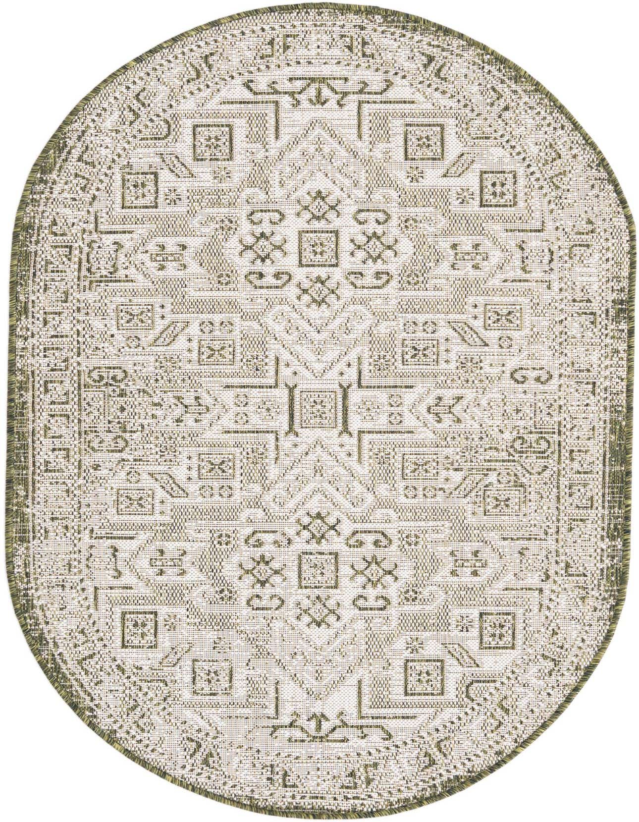 Oval green and white Southwestern rug with intricate tribal patterns, ideal for indoor or outdoor use.