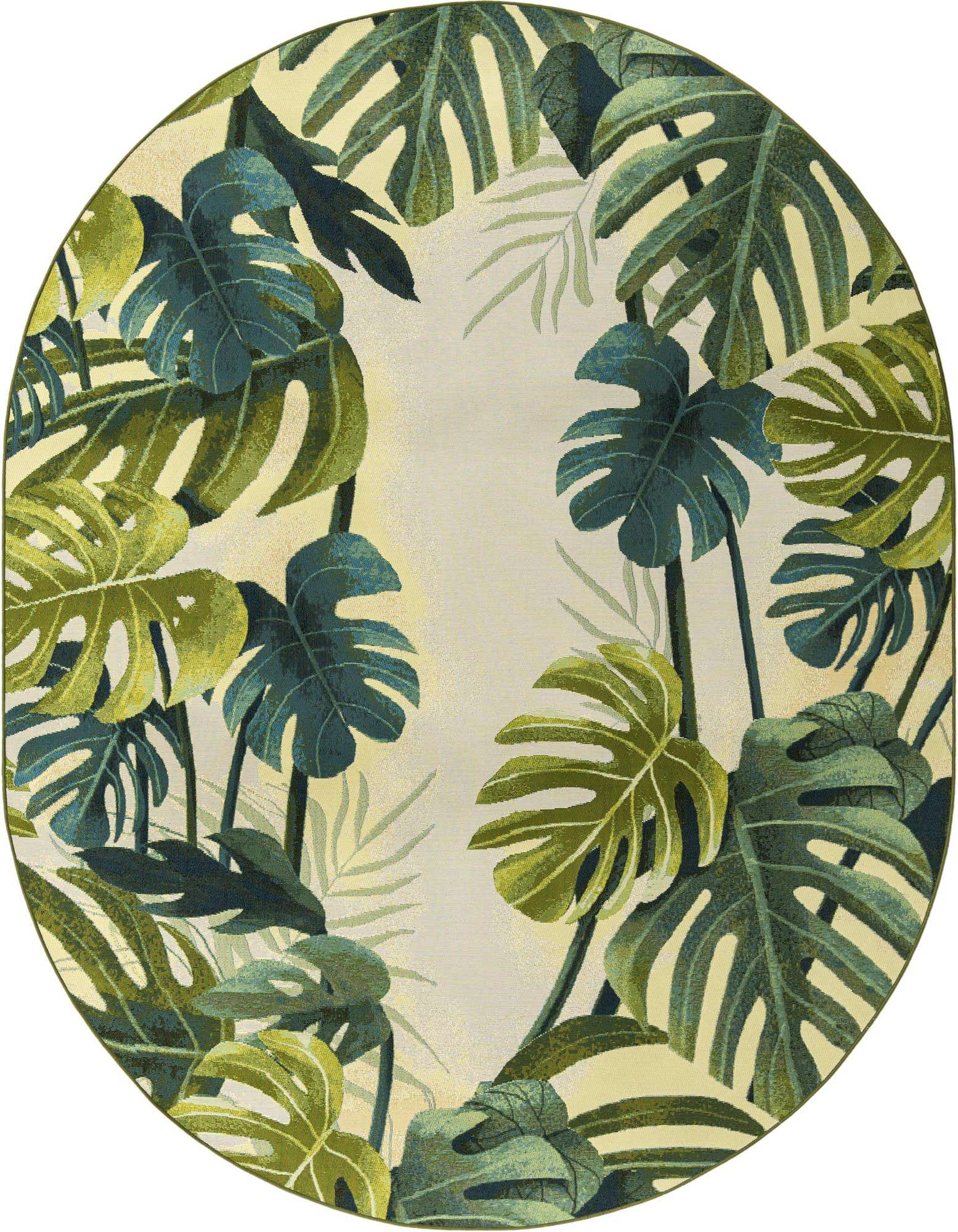 An oval green botanical rug with a vibrant pattern of large monstera and palm leaves on a light background, perfect for a patio.