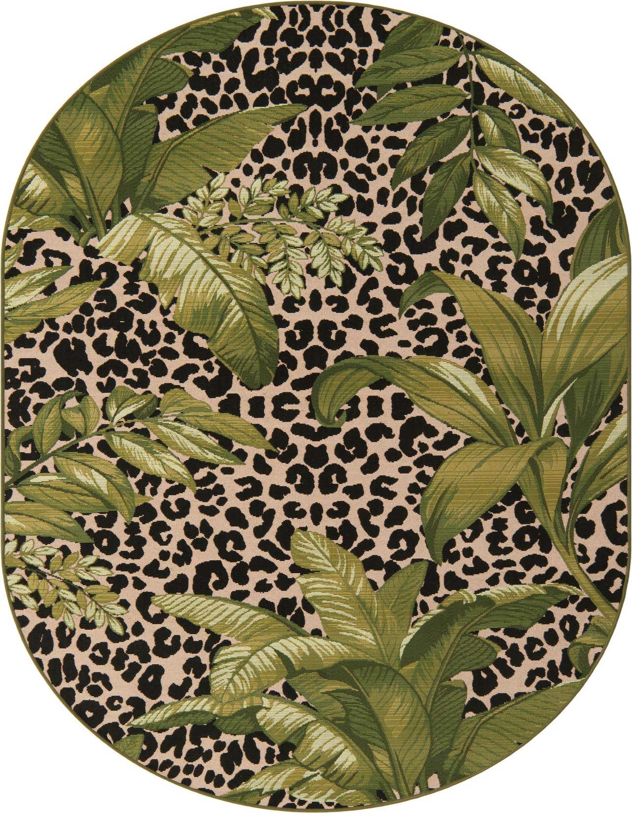 Oval green botanical rug with large leaves over a beige and black leopard print background, suitable for indoor or outdoor use.