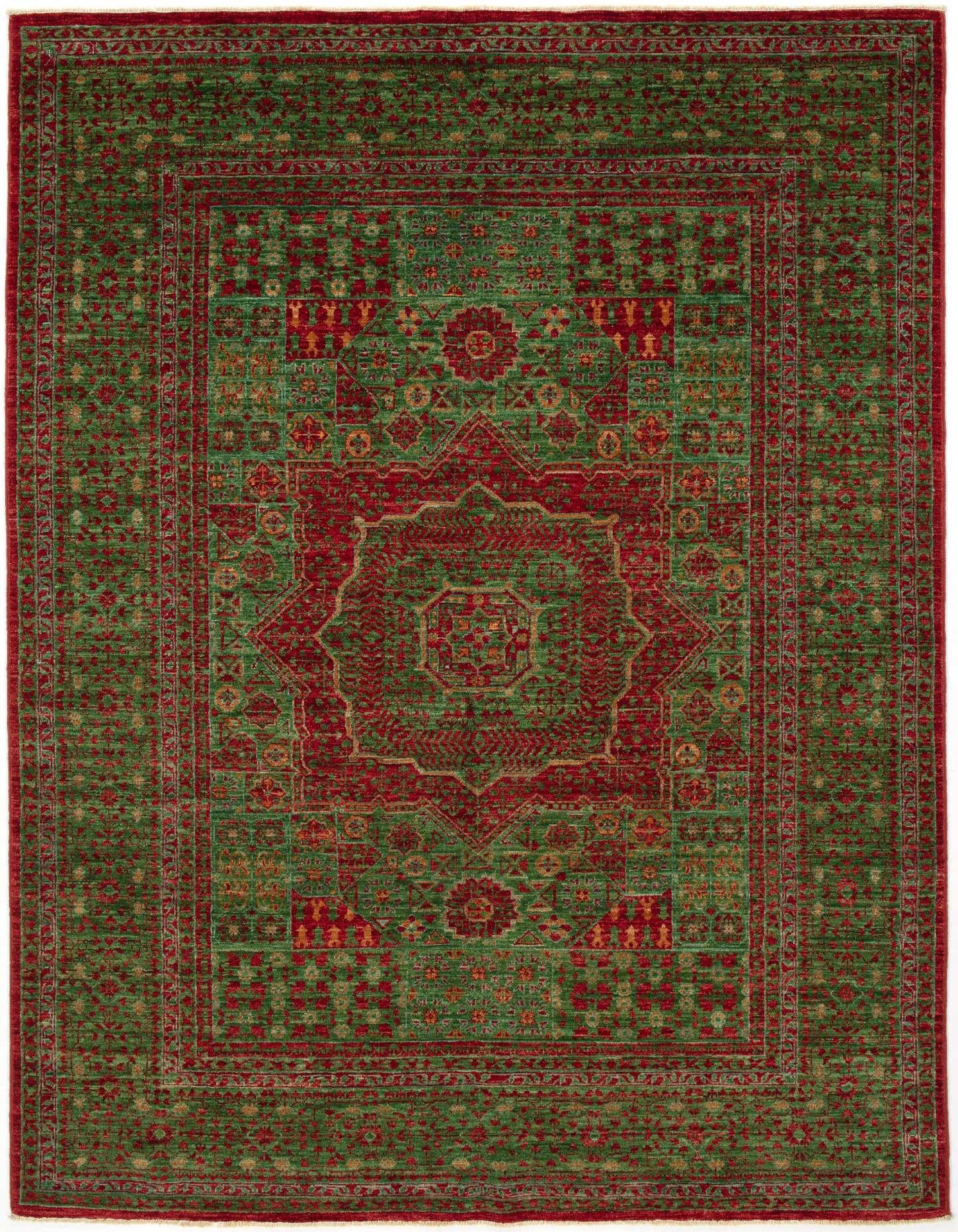 A 4x6 rectangular Amina Persian rug in shades of green and red, featuring an intricate medallion pattern.