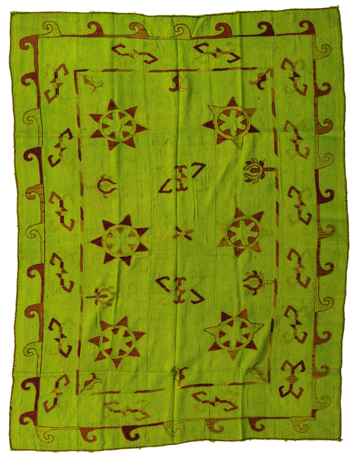 A 5x8 rectangular Kilim Suzani rug in vibrant green with a tribal pattern of reddish-brown stars and geometric motifs, suitable for a living room.