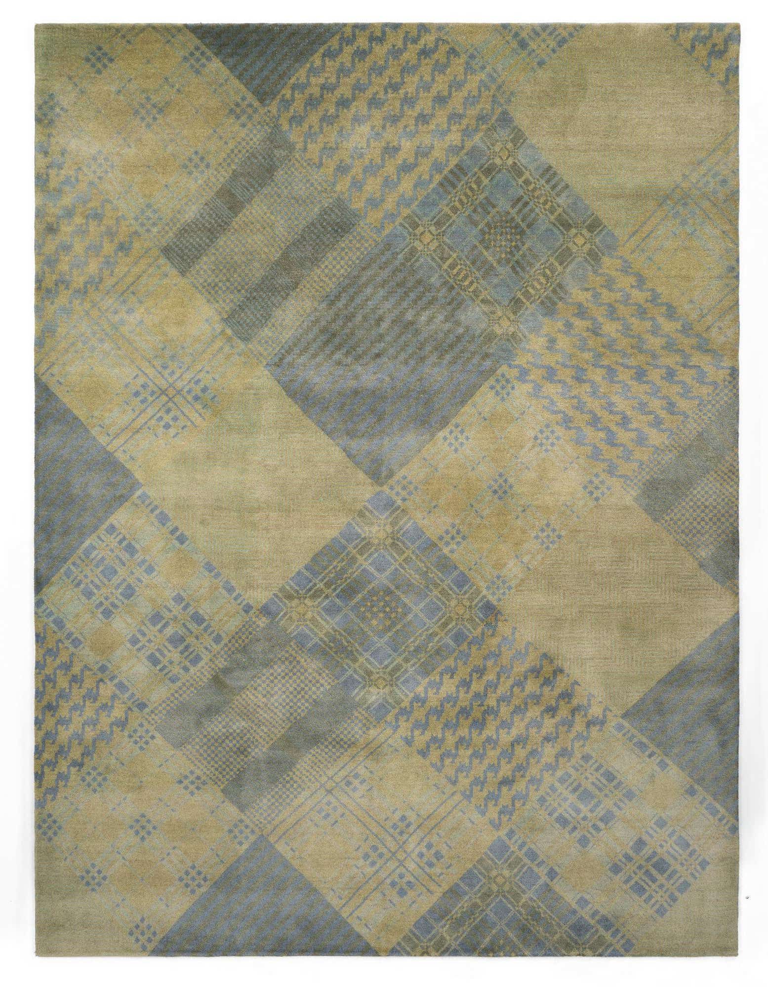 A rectangular 8x10 Modern Manshu wool rug featuring a patchwork of green and blue geometric and houndstooth patterns.