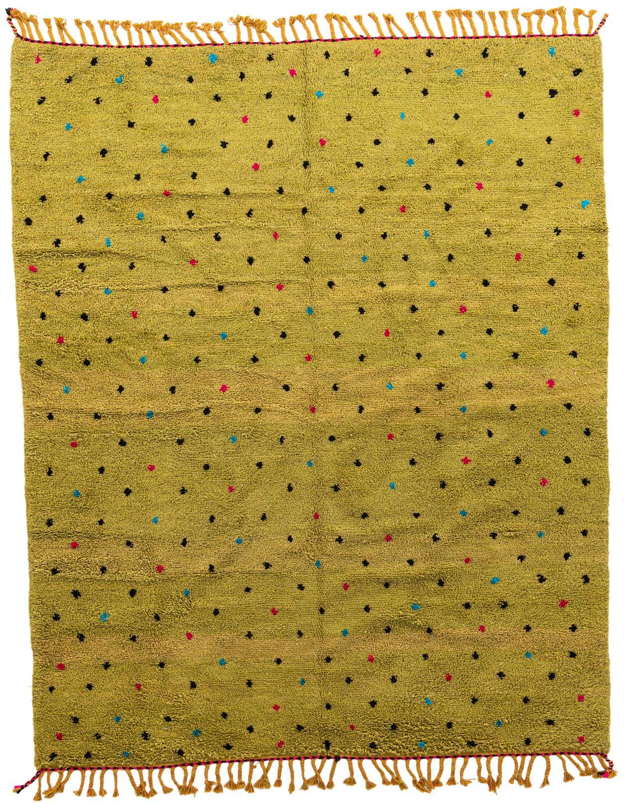 A 7x10 rectangular green shag rug with scattered black, pink, and blue polka dots, featuring fringed ends.
