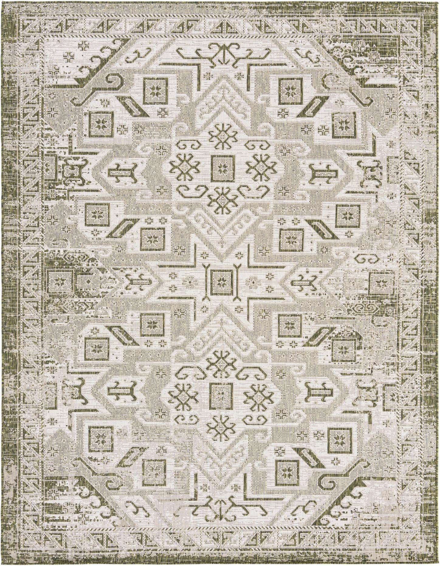 A 7x10 rectangular indoor/outdoor rug featuring a distressed green and beige Southwestern tribal pattern with geometric motifs.
