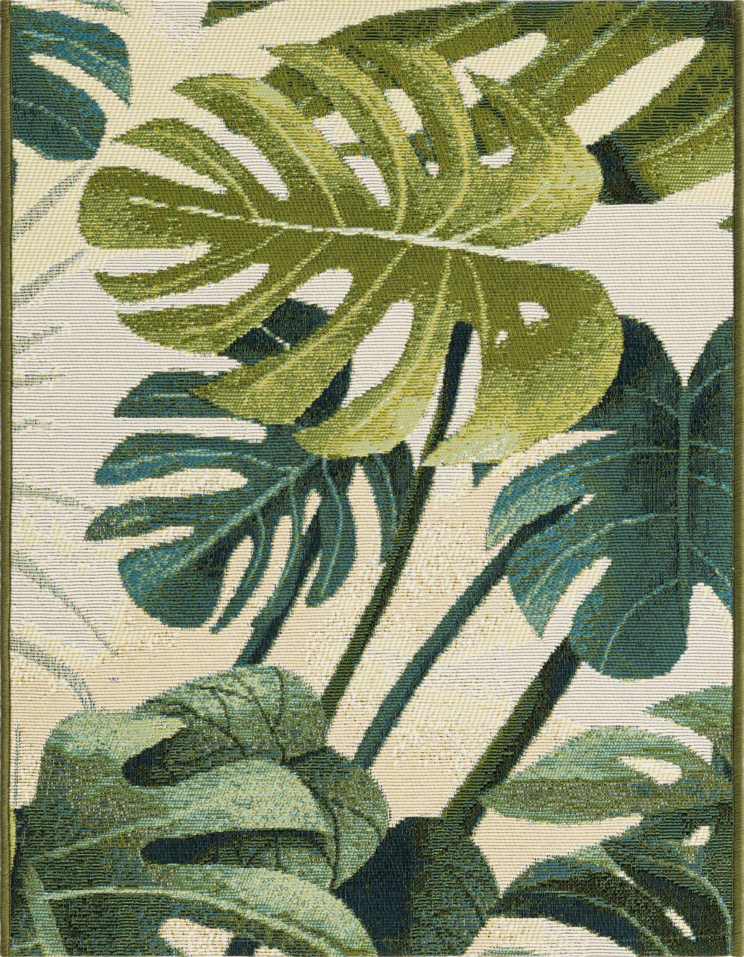 A 2x3 rectangular green indoor/outdoor rug with a vibrant botanical monstera leaf pattern on a light background, ideal for a patio.