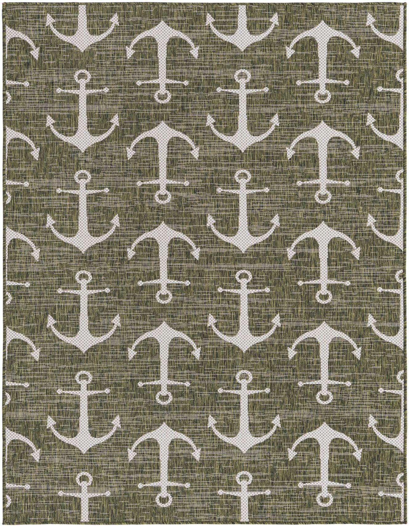A 5x8 rectangular green indoor/outdoor rug with a repeating pattern of white nautical anchors, suitable for a patio or living room.