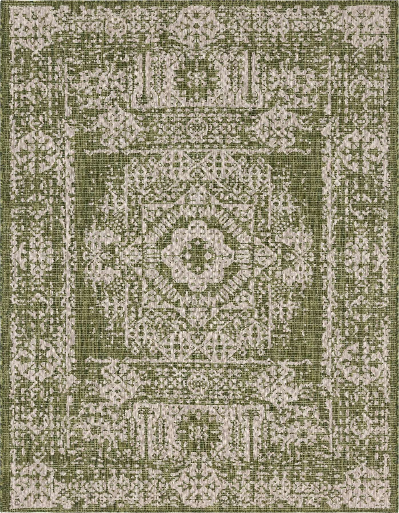 A 7x10 rectangular green and beige Southwestern medallion rug with a flatweave texture, suitable for indoor or outdoor use.