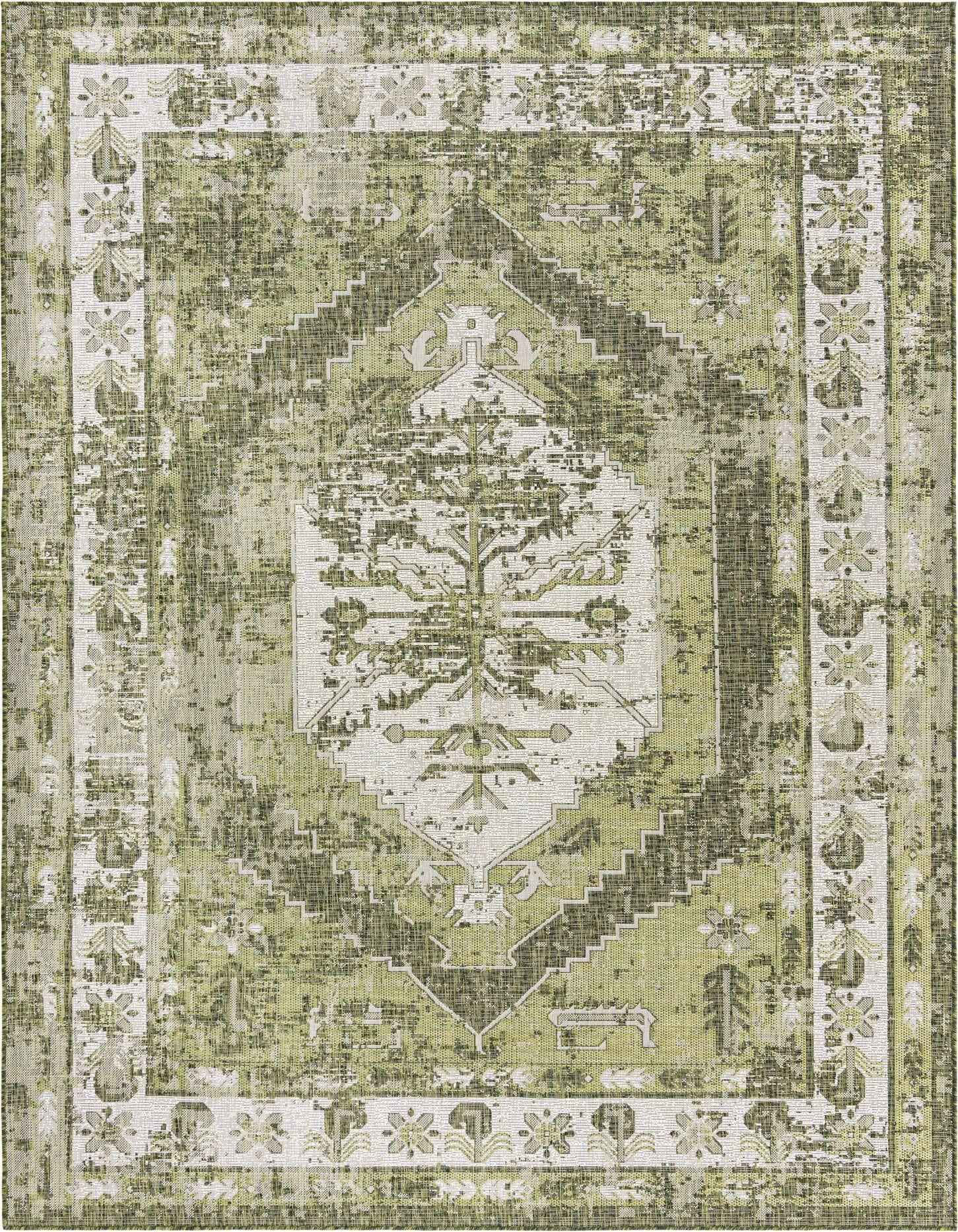 An 8x11 rectangular indoor/outdoor rug featuring a distressed Southwestern pattern in various shades of green and cream.