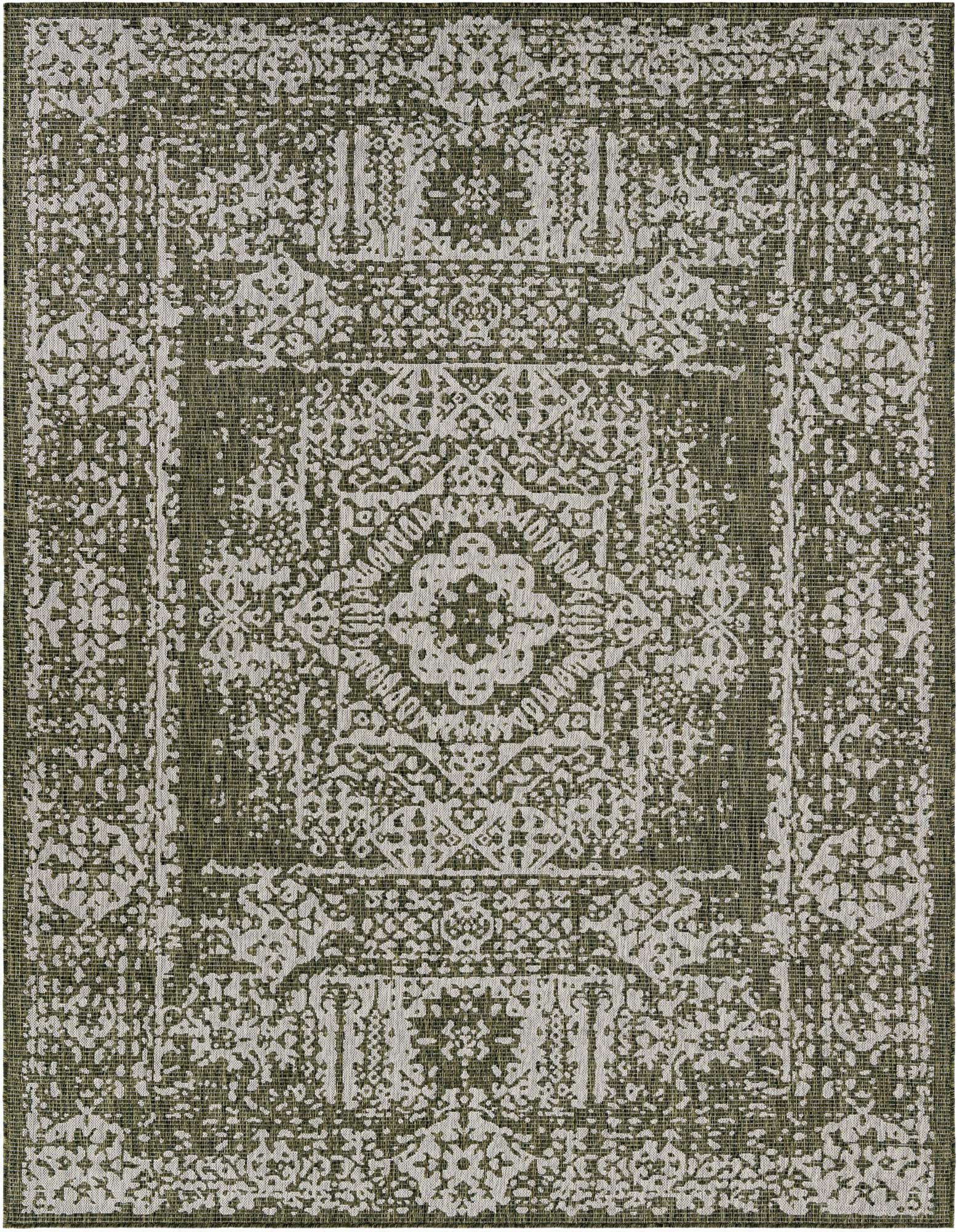 An 8x10 rectangular green and white flatweave rug with a distressed traditional medallion and border pattern, suitable for indoor or outdoor use.