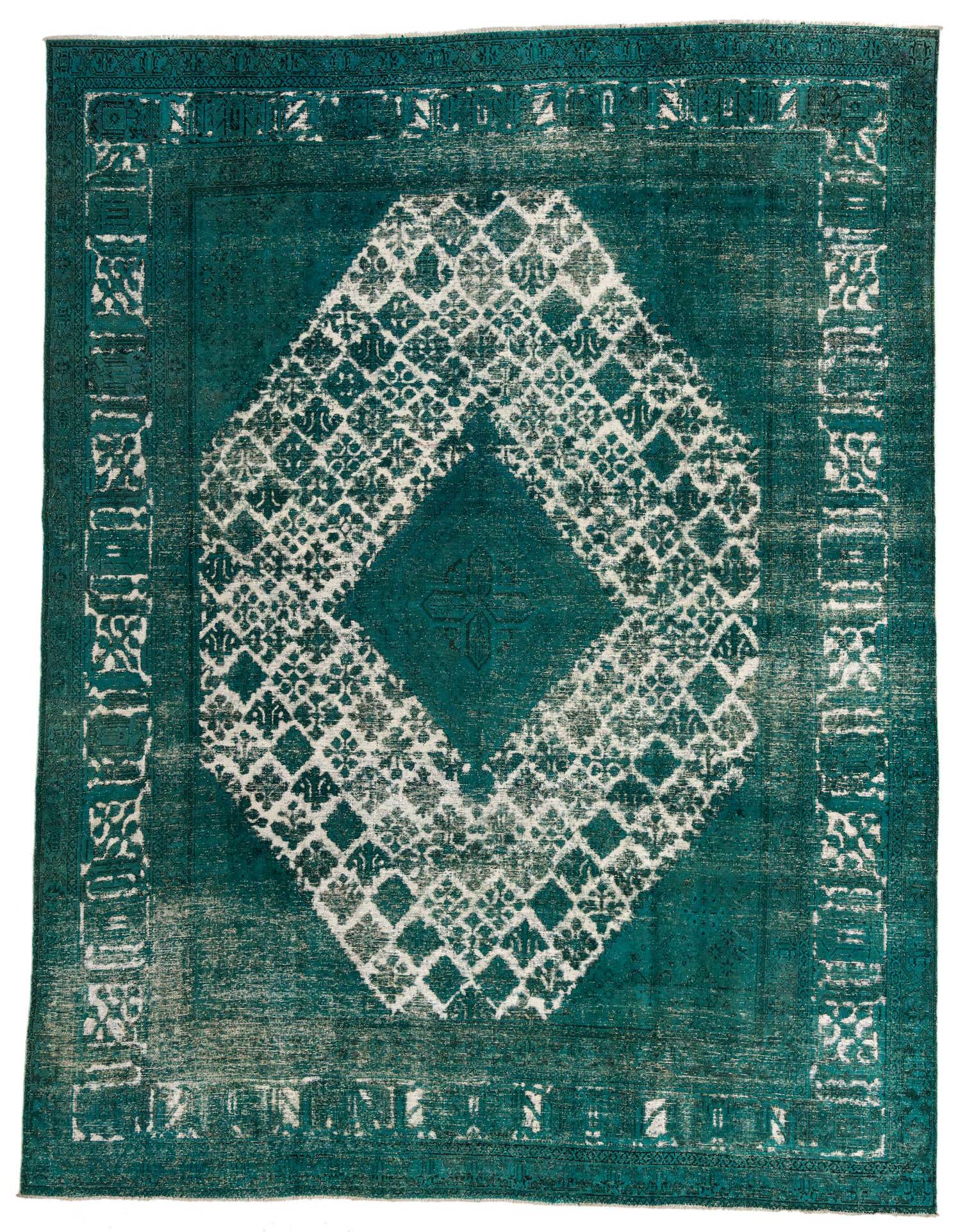 A 9x12 rectangular green wool rug with a distressed white medallion pattern and border, suitable for a living room.