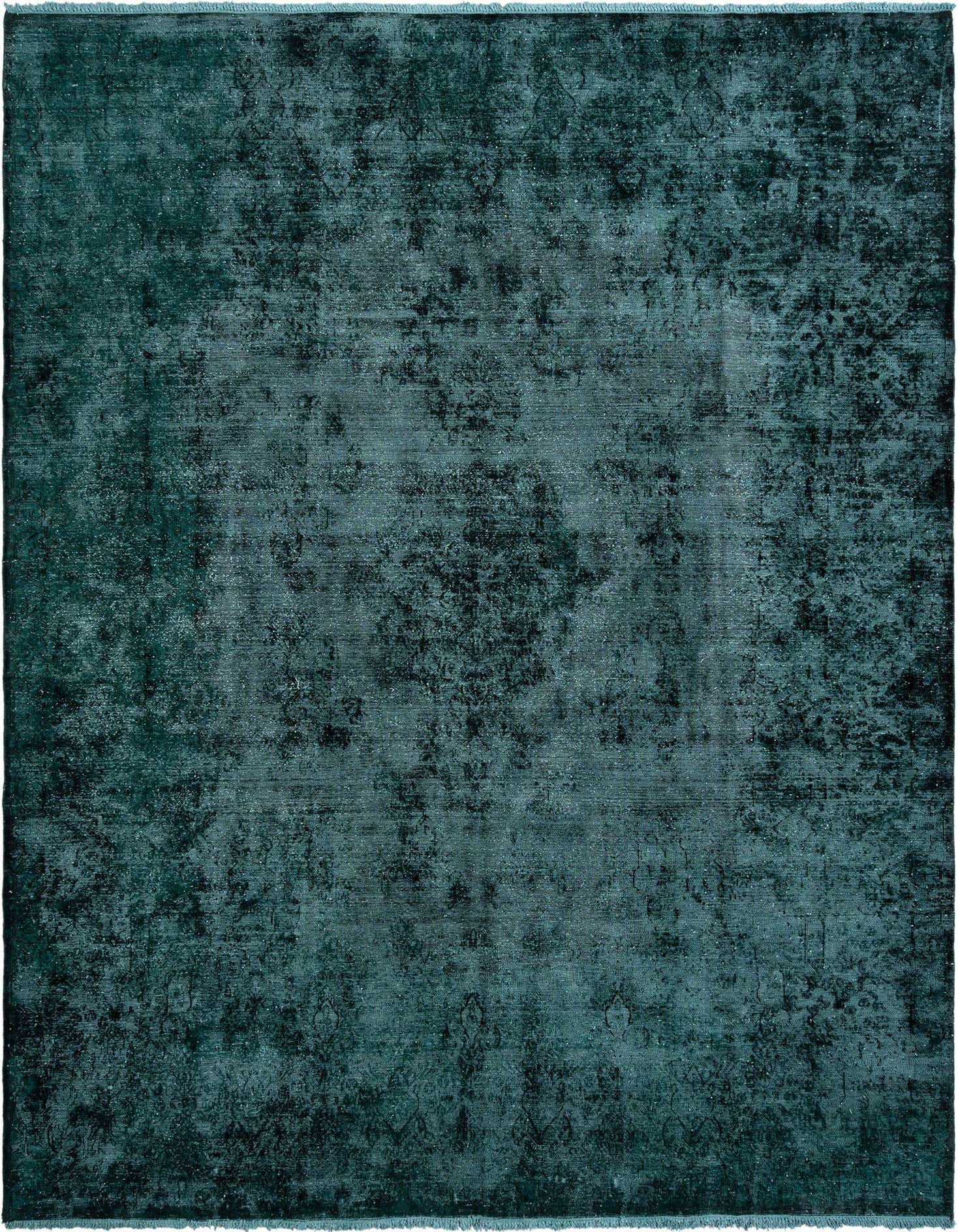 A large 10x13 rectangular green Persian rug with a distressed vintage pattern, suitable for a living room.