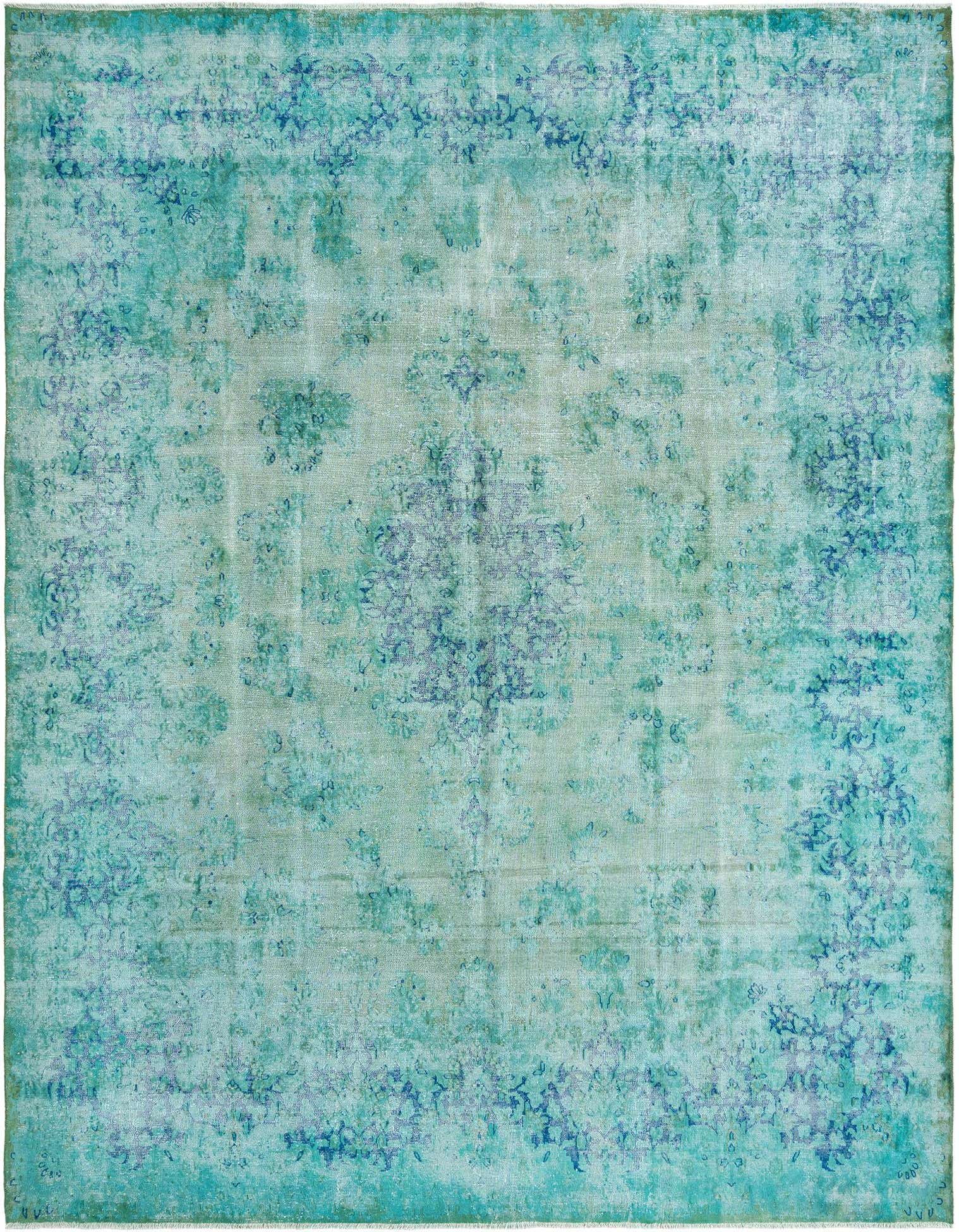 A 10x13 rectangular green Persian wool rug with a distressed, faded traditional pattern in various shades of green and blue.