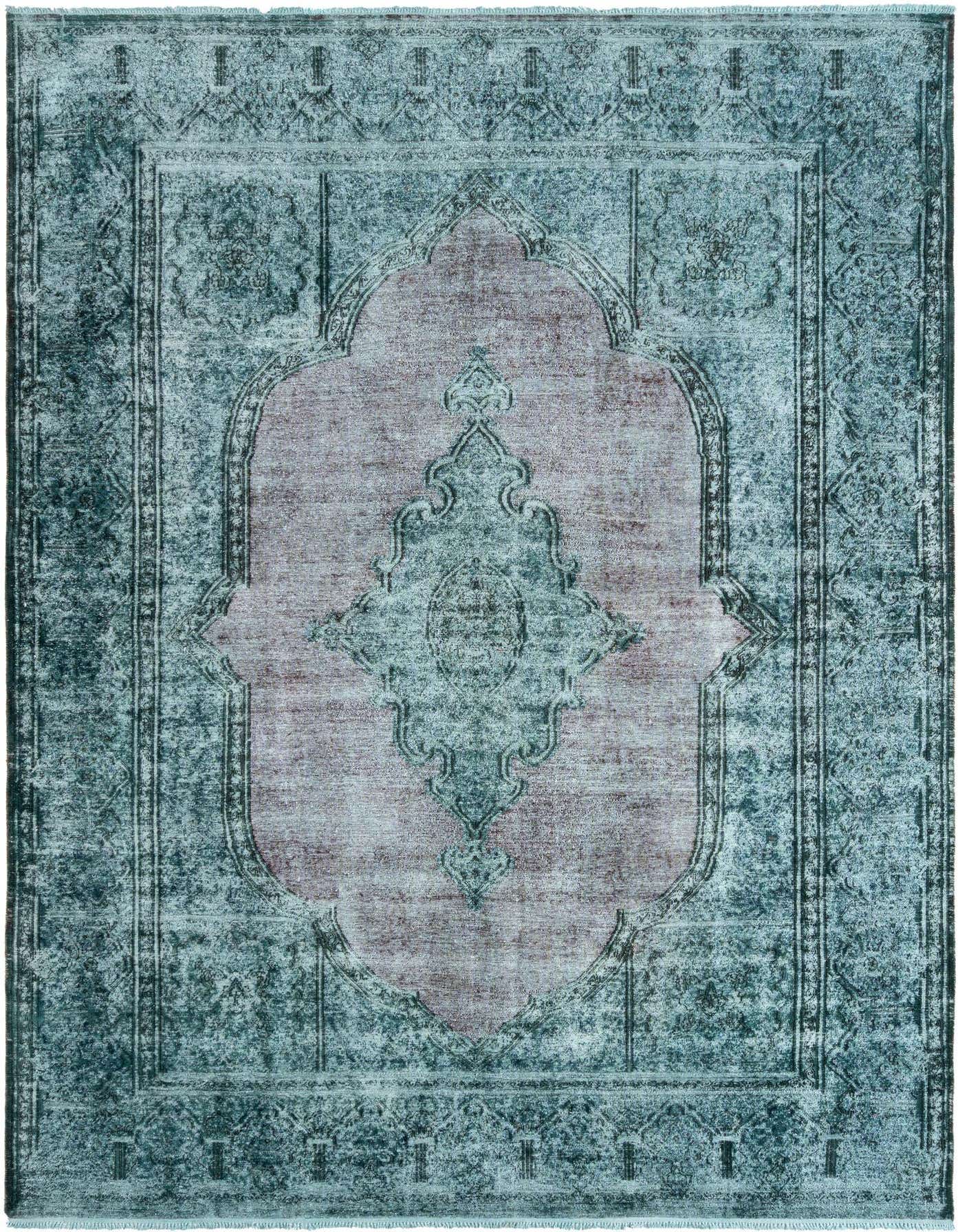 A 9x12 rectangular green Persian rug with a faded, distressed look and an ornate central medallion.