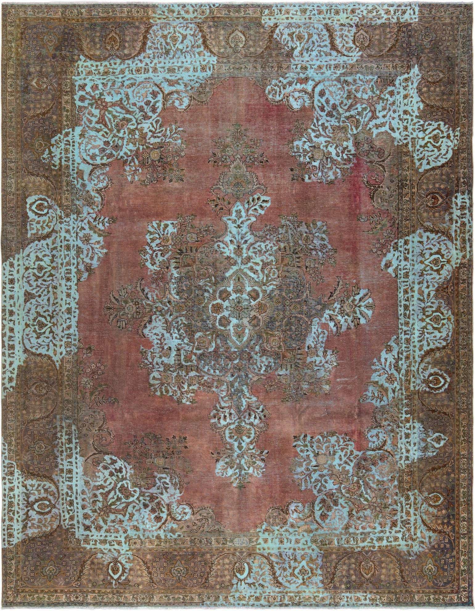 A 10x12 rectangular green Persian rug with a faded, distressed look, featuring intricate floral patterns.