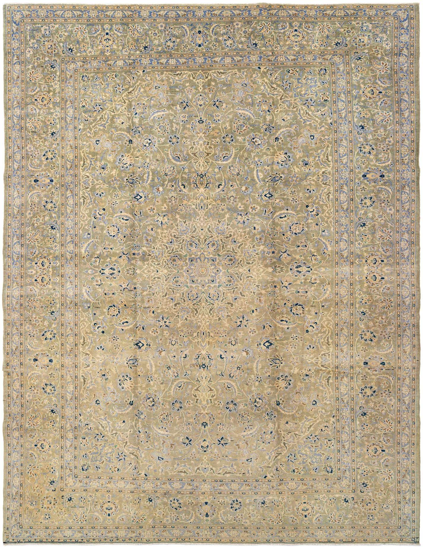 A large 9x12 rectangular Vintage Royal rug with a green field and intricate floral patterns in blue and cream, ideal for a living room.