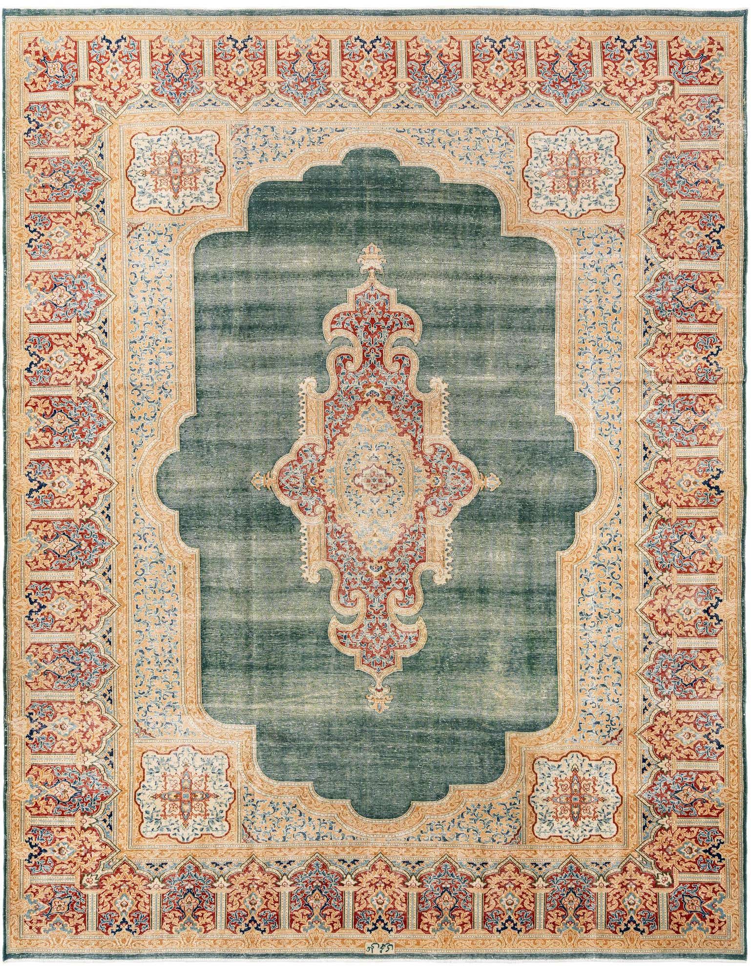 A large 10x13 rectangular green wool area rug with an intricate traditional pattern and a wide beige border.