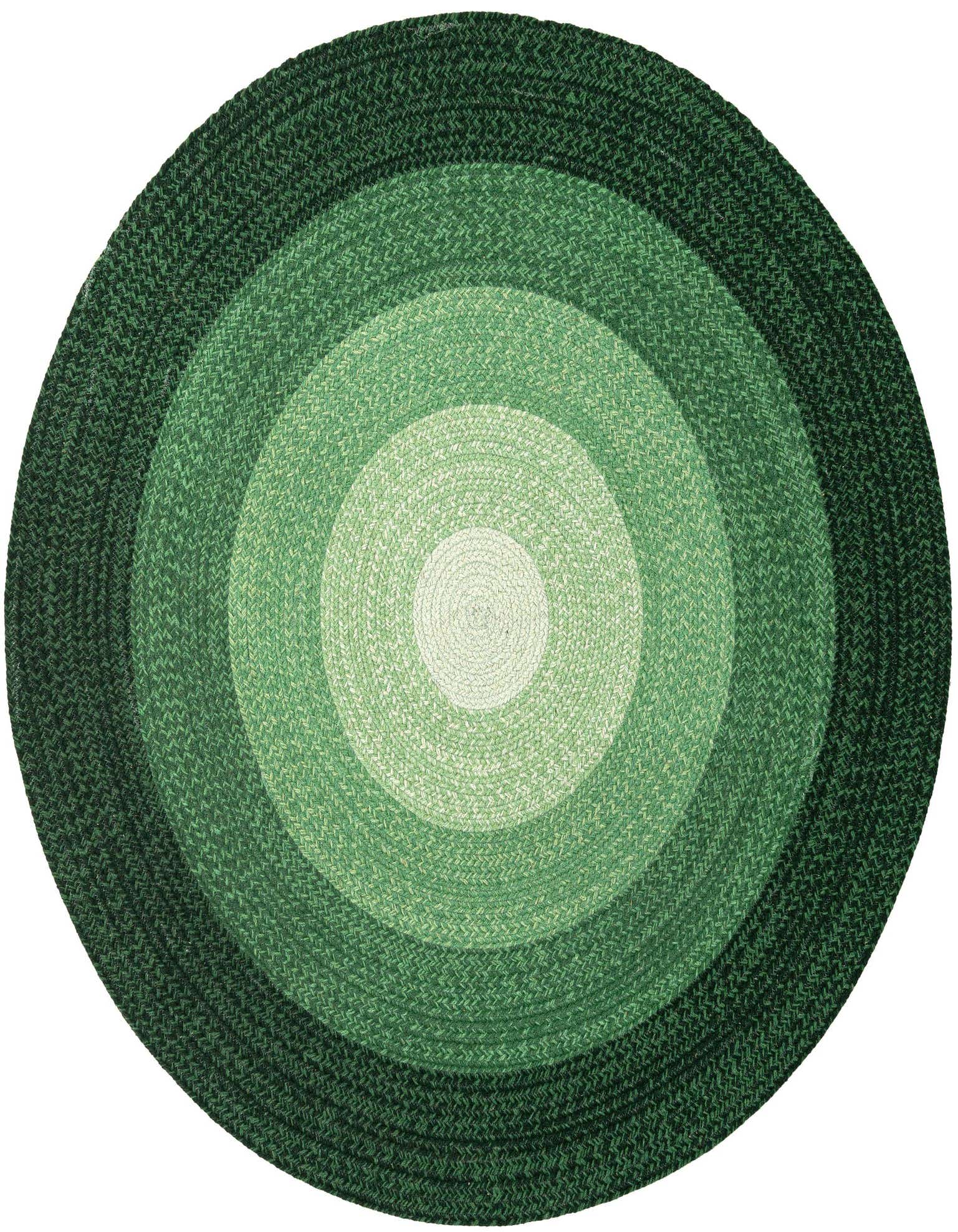 A round, hand-braided wool rug featuring concentric circles in varying shades of green, from light to dark.
