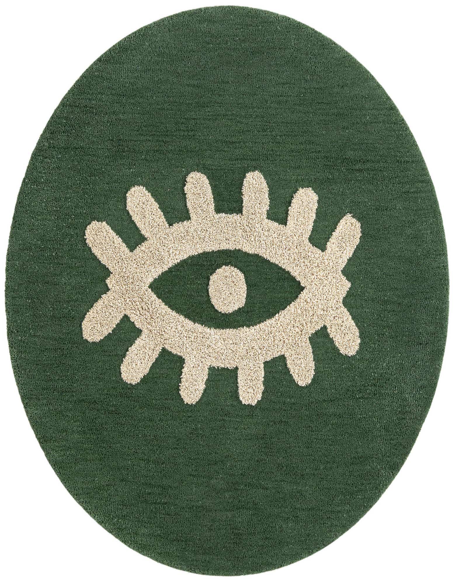 A round green rug with a raised, light beige evil eye symbol in the center, featuring a high pile.