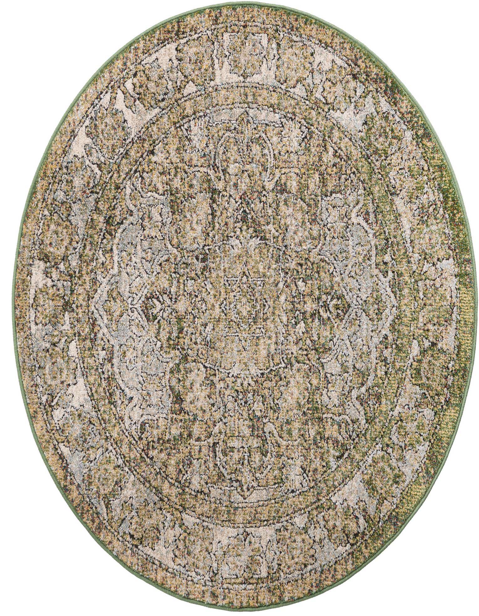 A 4' round Isabella rug in shades of green with a distressed traditional medallion pattern and a high/low textured pile.