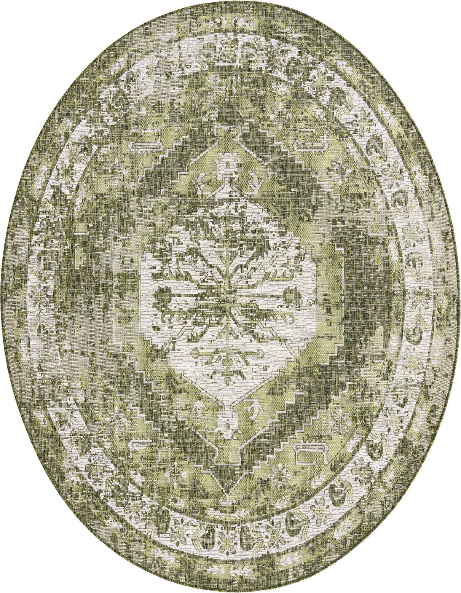 A large round green and white Southwestern-style outdoor rug with a distressed traditional pattern, ideal for a patio.