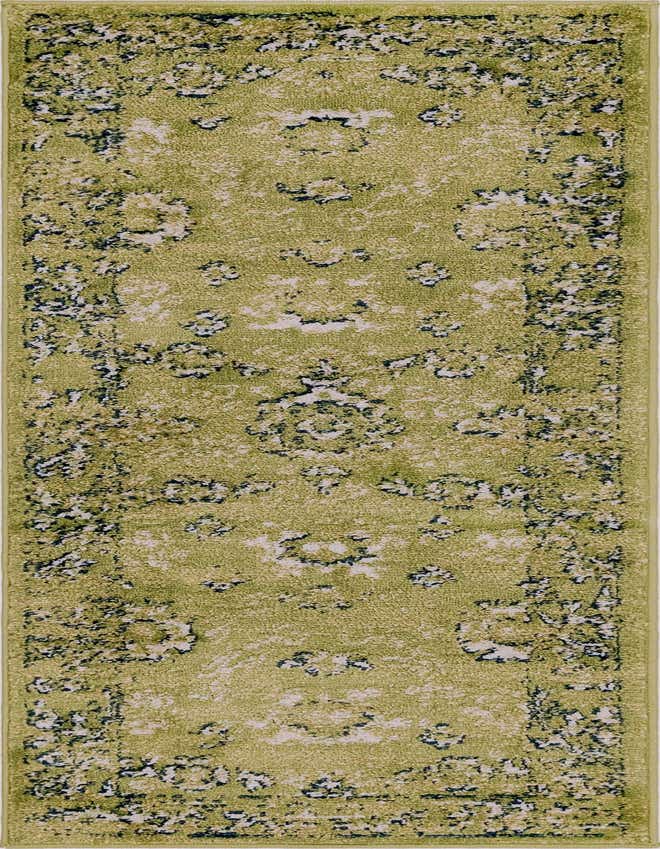 A 6 ft runner rug in shades of green with a distressed traditional medallion pattern, ideal for a hallway or kitchen.