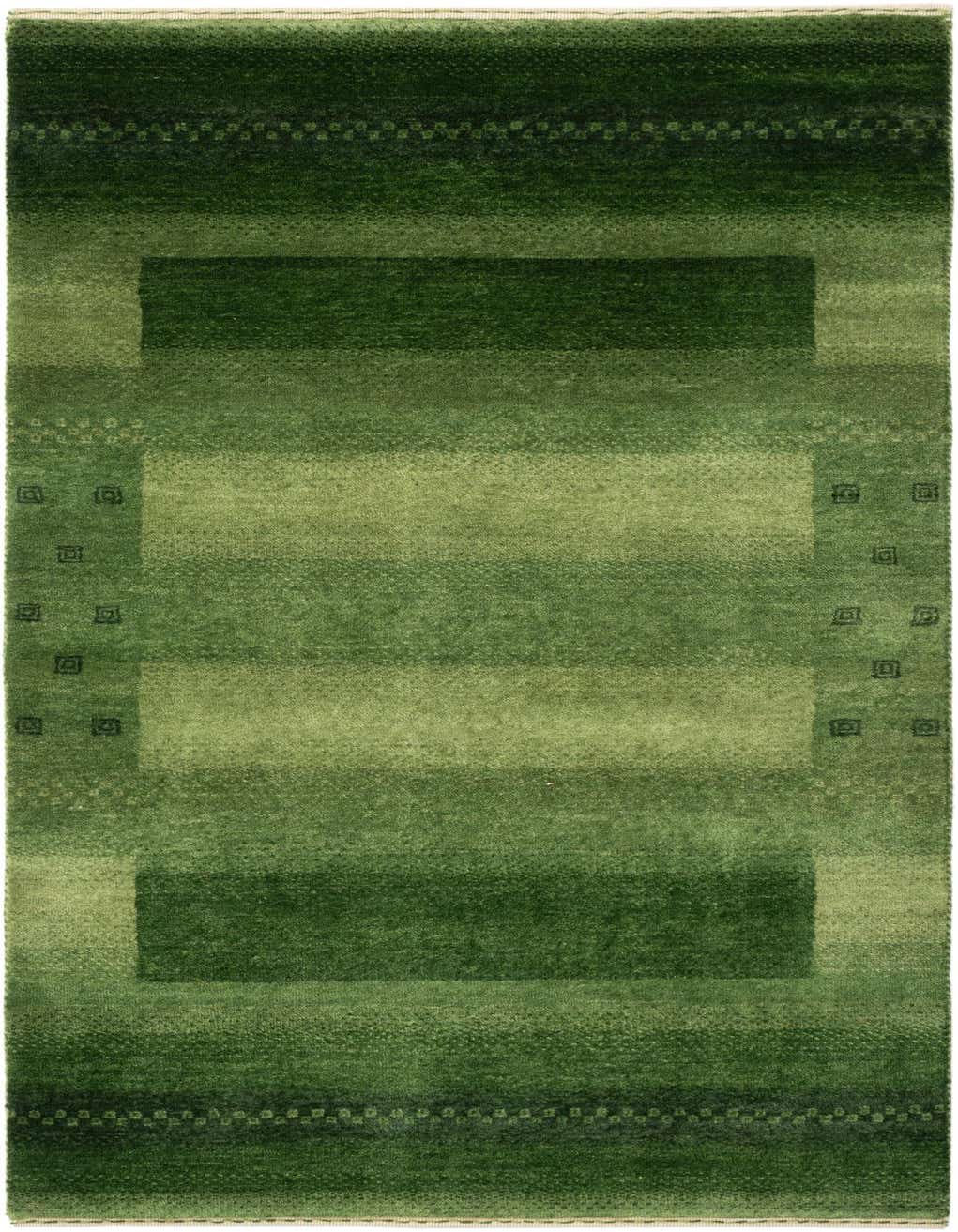 A 5 ft runner rug in varying shades of green, featuring a modern abstract pattern with subtle geometric accents, ideal for a hallway.