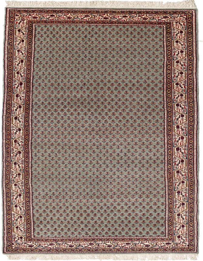 A 9 ft green runner rug with a traditional Oriental pattern, featuring a repeating floral motif in the center and an intricate border in red, cream, and brown.